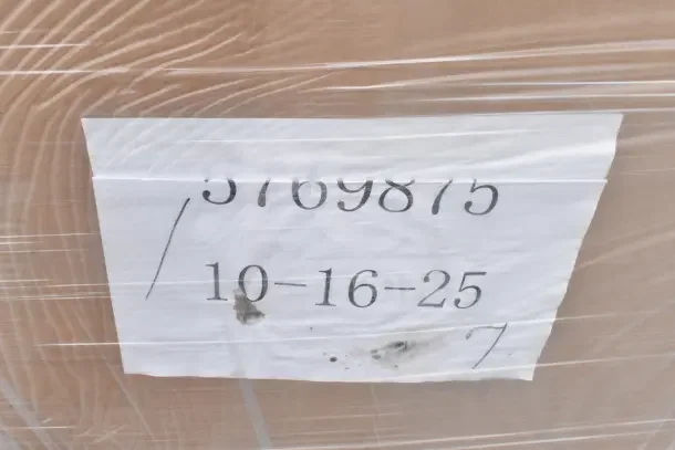 Pallet wrapped in plastic, labeled with numbers, containing 10 brand new scratch and dent items.