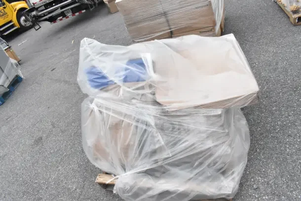 Pallet with 11 new scratch and dent items includes switch kit, plates, bowls, wrapped in plastic for auction.