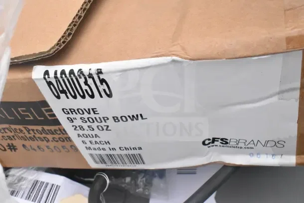 Cardboard box labeled "Grove 9-inch Soup Bowl, 28.5 oz, Aqua, 6 Each, Made in China" by CFS Brands, showing packaging condition.