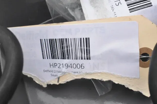Barcode and label showing "Delfield OEM PARTS" with model number HP2194006.