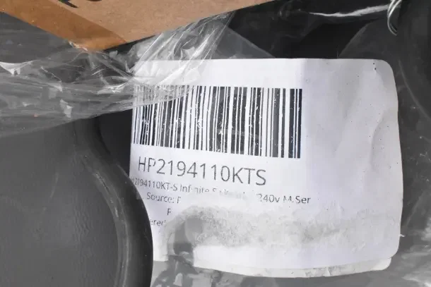 Barcode labeled "HP2194110KTS" on packaging for scratch and dent items including switch kit, plates, bowls.