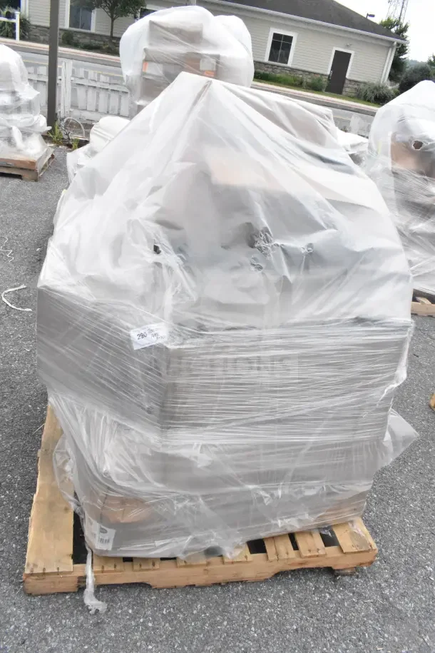 Plastic-wrapped pallet of mixed scratch and dent items, new condition. Handwritten tag reads "290 10% off MSRP x10."