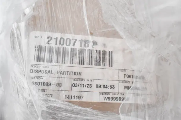Plastic-wrapped item with label showing "2100718" and "Disposal Partition." Includes barcodes and item details. Brand new.