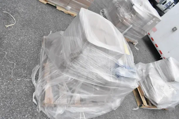 9 new scratch & dent items, including T&S G-2C-48K gas hoses, and 10211301 water softener, wrapped on a pallet.