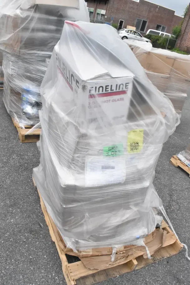 Pallet with 13 scratch and dent items, including umbrella canopy and mop bucket, wrapped in plastic. Labels indicate Fineline brand.