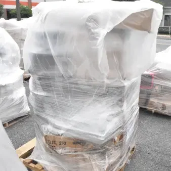 Plastic-wrapped pallet containing 13 brand new scratch and dent items, including dough sheeter and food pans, on an outdoor surface.