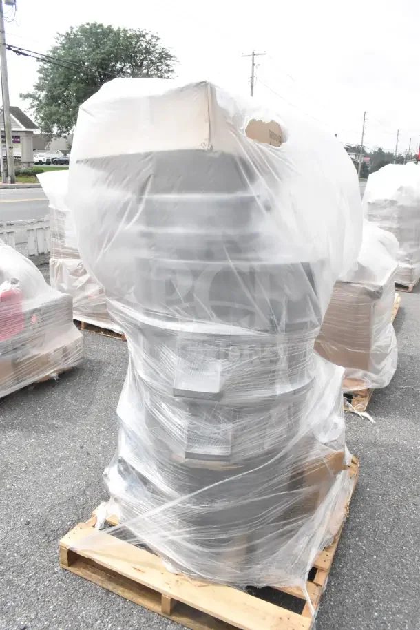 13 new scratch and dent items including a dough sheeter, wrapped on pallet, ready for auction.