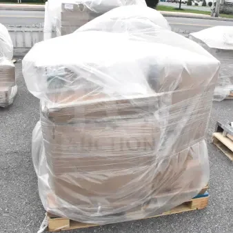 Pallet with 7 new scratch and dent items, wrapped in plastic. Includes sink and filler table.