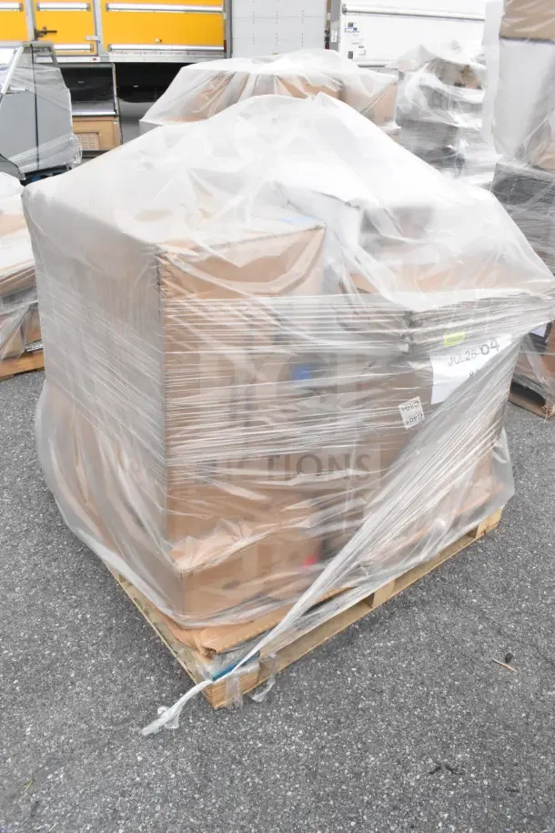 Plastic-wrapped pallet with seven brand new scratch and dent items, including a sink and filler table, visible label "JUL26-64".