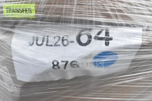 Packaged auction lot with 7 new scratch and dent items. Visible label: "JUL26-64" and "TRANSFER" tag.