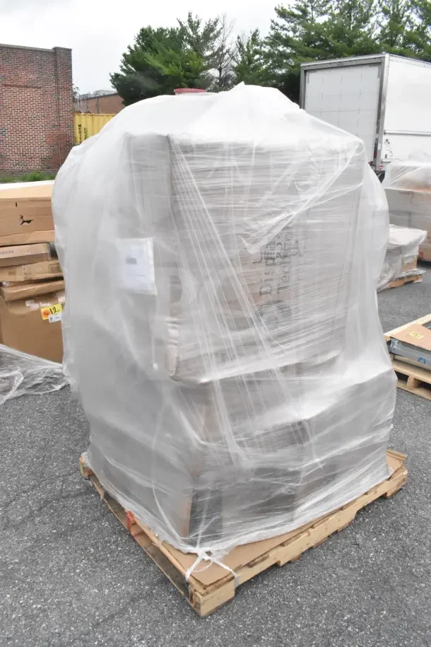 Pallet of 21 brand new items, including grinder plates and wine glasses, wrapped in clear plastic. Scratch and dent condition.