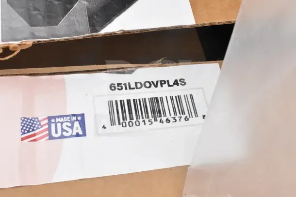 Box with label "Made in USA," barcode, and model "651LDOVPL4S." Contains 21 new scratch-and-dent items like forks and lids.