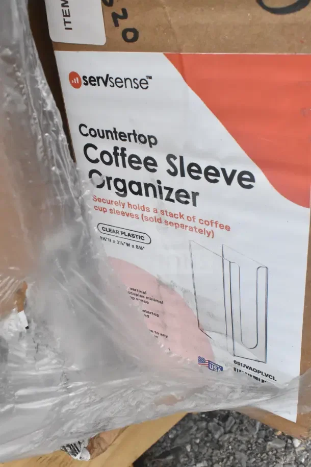 ServSense Coffee Sleeve Organizer box, new condition, wrapped in plastic. Holds coffee cup sleeves, model details on label.