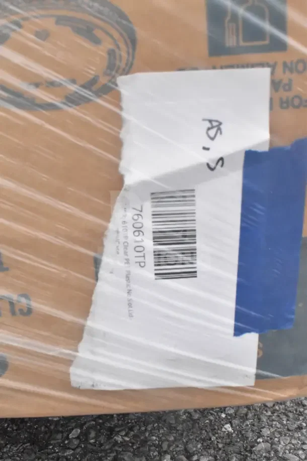 21 new scratch and dent items including bakery box, utensils, and lid organizer; barcode 760610TP visible.