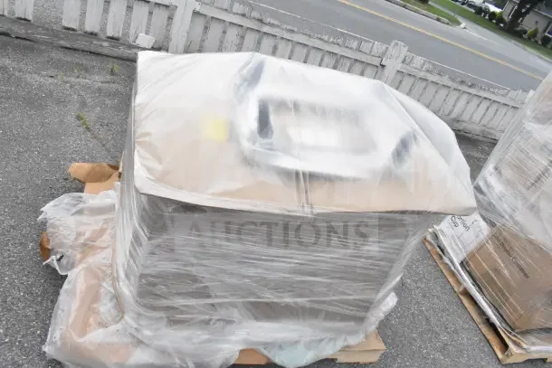 Hatco GRHD-3PD Glo-Ray Merchandiser, wrapped, on dolly. Includes visible packaging materials. Condition: Scratch and Dent.