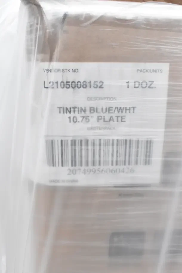"Tintin Blue/White 10.75" plates, 1 doz. Vendor STK: L2105008152. Barcode 20749956060426, Made in China."