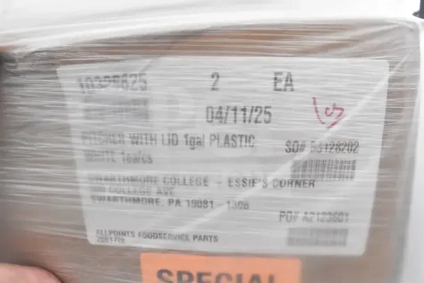 Plastic-wrapped package labeled "1gal Plastic Pitcher with Lid" and marked "SPECIAL." Includes shipping and product info.