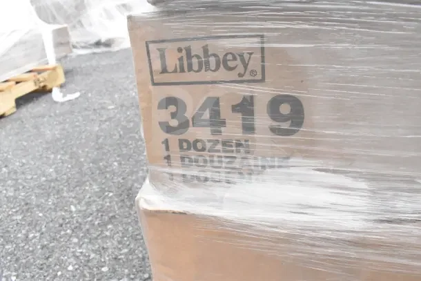 Libbey box marked "3419" and "1 dozen" under plastic wrap, containing 37 new scratch and dent items like bowls and plates.