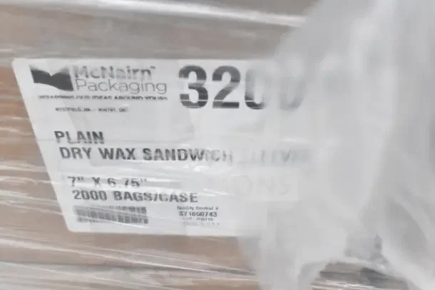 Bundle of McNairn Packaging dry wax sandwich sleeves, 7"x6.75", 2000 bags per case, new condition, scratch and dent.