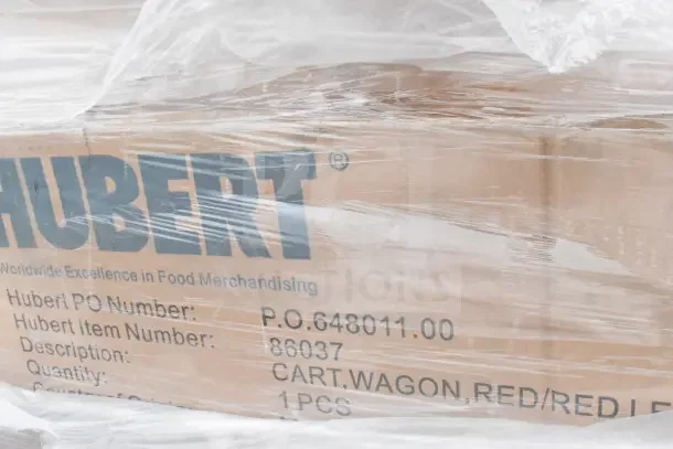 Hubert packaging with PO number 648011.00, item number 86037, labeled "CART, WAGON, RED/RED LE," wrapped in plastic.