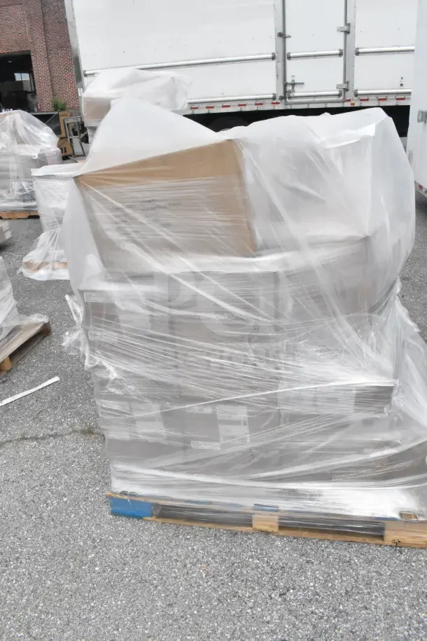 Pallet with 13 brand new scratch and dent items, wrapped in plastic. Includes pots, tumblers, glasses.