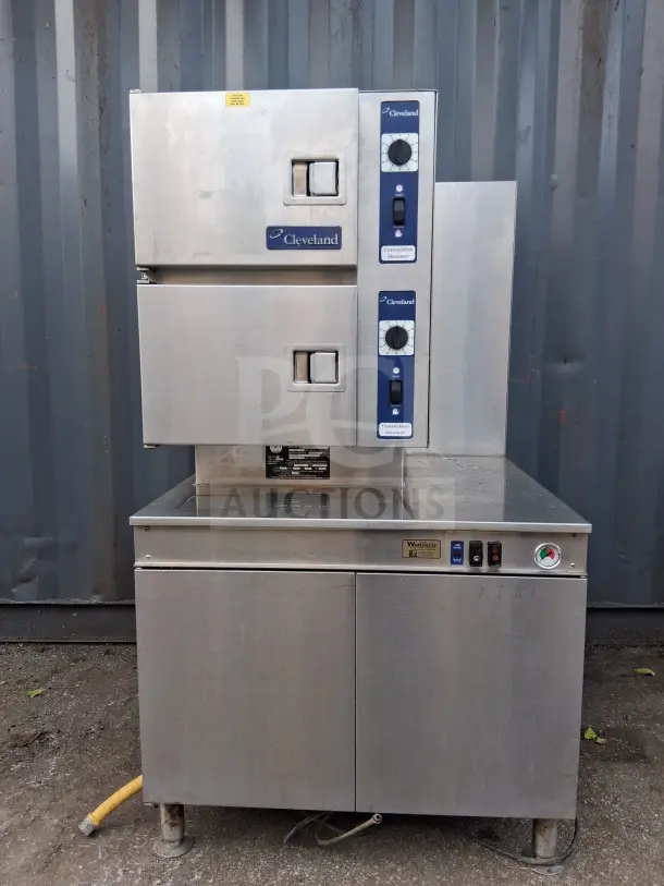 Cleveland Double Gas Steamer, stainless steel, dual control panels, Cleveland logo, used condition, industrial kitchen equipment.