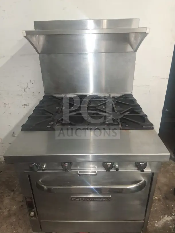 Southbend P32D 32" 4 burner gas range with standard oven, natural gas, stainless steel, visible Southbend logo, used condition.