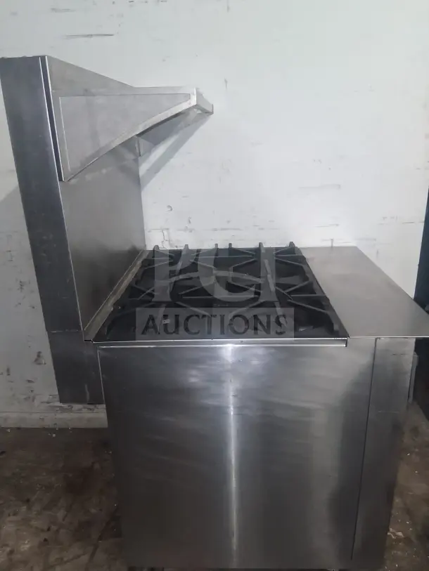 Southbend P32D 32" gas range with 4 burners and standard oven, stainless steel, natural gas. Good condition.