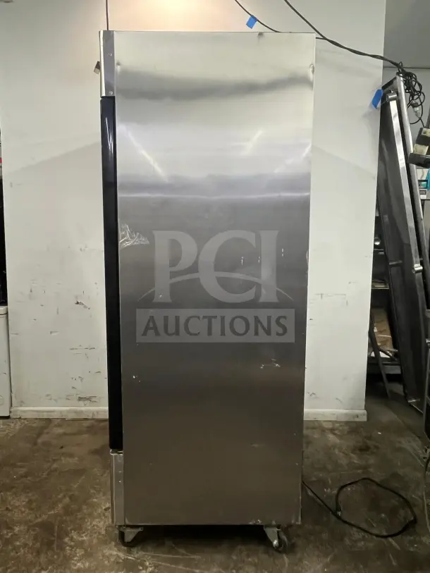 NORTH AMERICAN Precision Series A2GDF double glass door merchandiser freezer, stainless steel, on casters. Slight wear visible.
