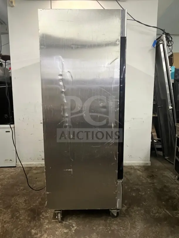 NORTH AMERICAN A2GDF double glass door merchandiser freezer. Stainless steel, wheeled, visible wear.