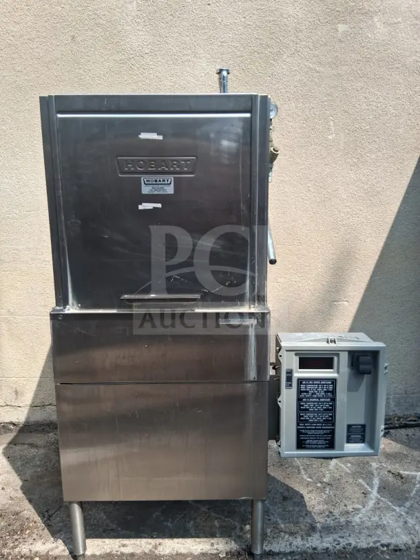 HOBART AM14 high-temp commercial dishwasher, stainless steel, model AM14, good condition, visible control panel and brand labels.