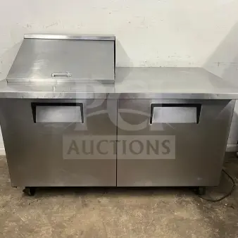 TRUE TSSU-60-12M 2 Door Mega Top Refrigerated Pizza Prep Table, stainless steel, holds 12 pans, used condition.