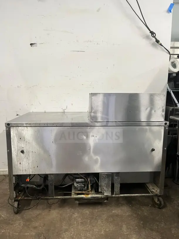 TRUE TSSU-60-12M refrigerated pizza prep table, two doors, includes 12 pans, stainless steel, worn condition, visible wiring.