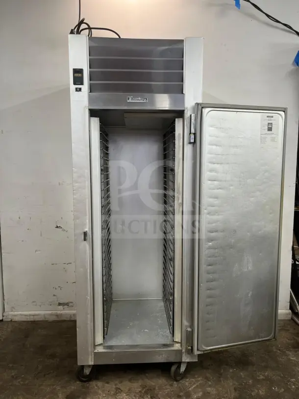 Traulsen G10010 30" solid door reach-in refrigerator, right hinged, stainless steel, excellent condition, visible label.