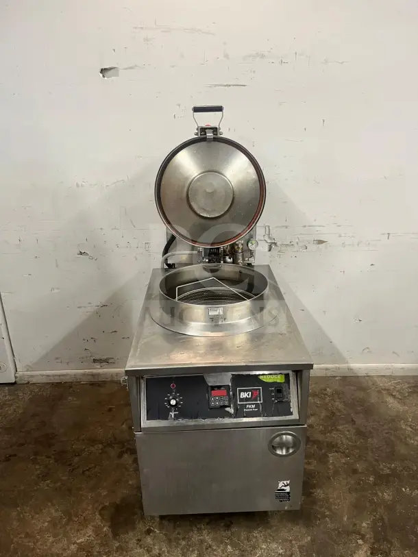 BKI FKM-F 24-inch electric pressure fryer with manual controls, stainless steel, extra-large volume, used condition.