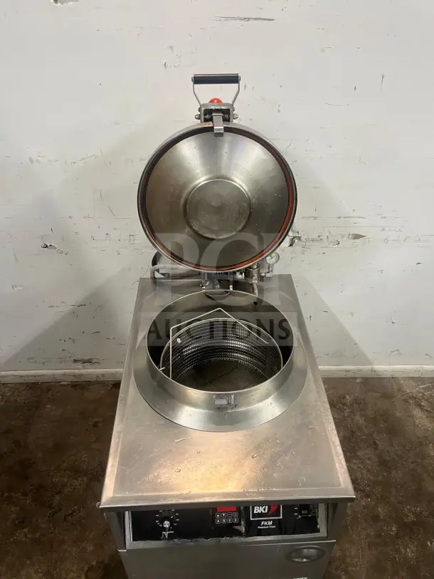 BKI FKM-F 24-inch electric pressure fryer, manual control, stainless steel, extra-large volume, visible control panel.