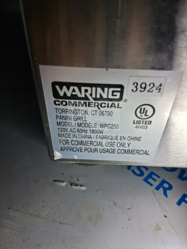 Waring WPG250 Panini Grill label showing model, voltage, and commercial use details.