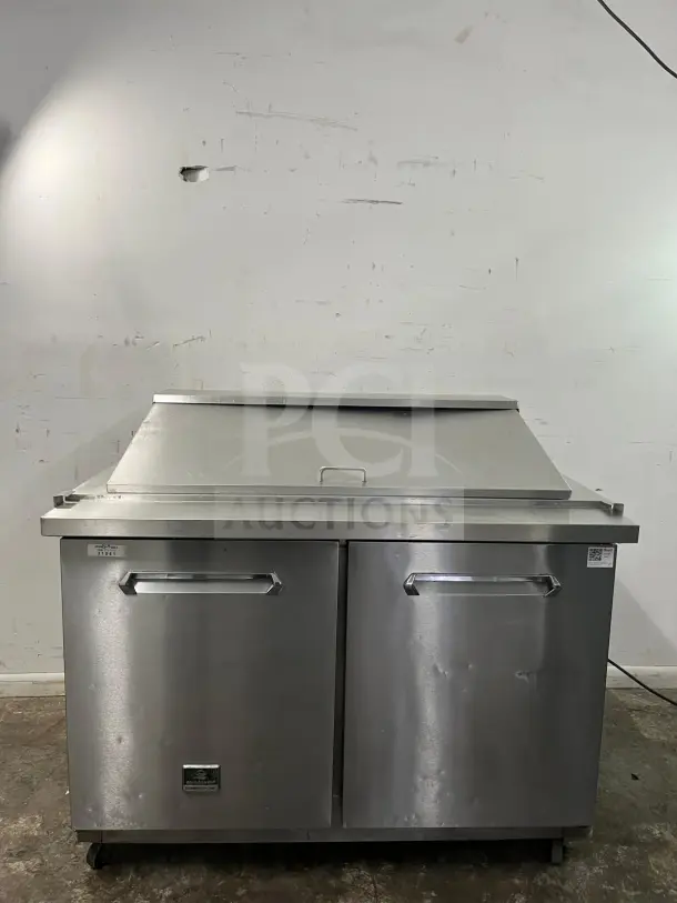 Kelvinator Commercial KCHMT48 48" prep table, refrigerated base, stainless steel, two-door, good condition. Model KCHMT48.