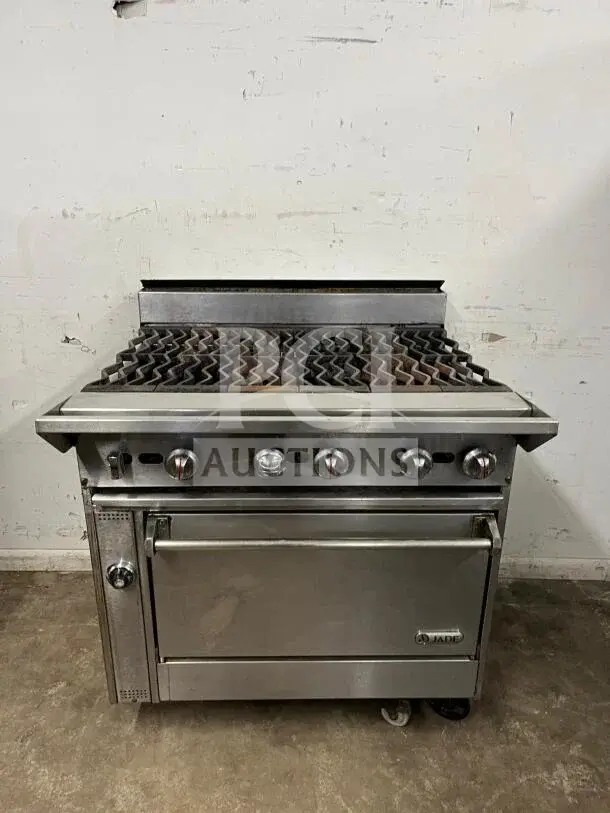 Handcrafted Jade Bistro Series 6-burner charbroiler top with oven range. Commercial grade, stainless steel, excellent condition.
