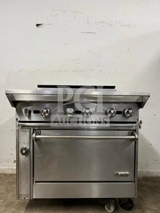 JADE Bistro Series 6-burner charbroiler and oven range. Stainless steel, handcrafted. Commercial-grade, excellent condition.