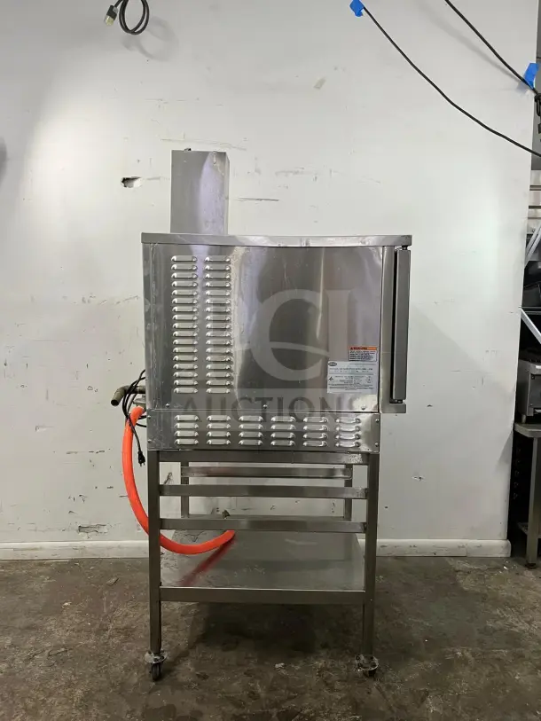 SOLARIS SX-5GR natural gas convection steamer, 42,000-47,000 BTU, includes cooling racks, stainless steel, good condition.