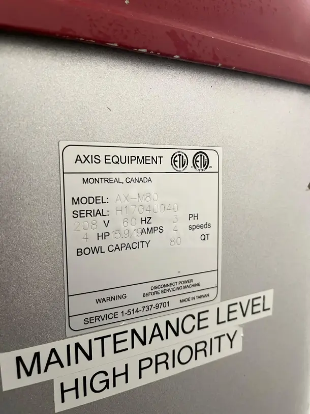 AXIS AX-M80 80-Quart Commercial Mixer, 4 speeds, 4 HP. Label shows model, specs, and high priority maintenance note.