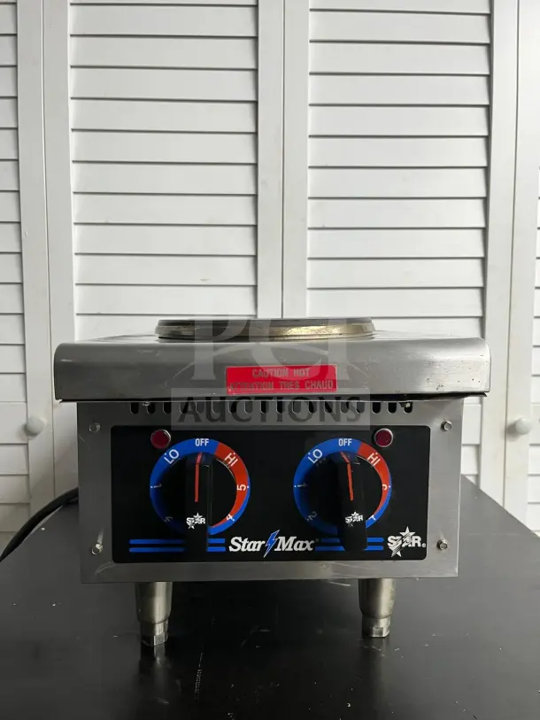 Star-Max 602HF 12" electric hot plate with dual controls, in good condition. "Caution Hot" label visible.