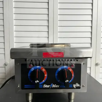 Star-Max 602HF 12" electric hot plate with dual controls, in good condition. "Caution Hot" label visible.