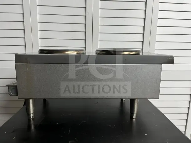 Star-Max 12" electric hot plate, Model 602HF, by StarMax. Features two burners, stainless steel finish. Used condition.