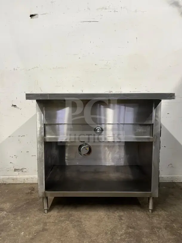 24" stainless steel steam table, electric, durable construction, good condition, sturdy legs, visible control knob.