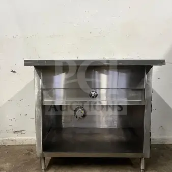 24" stainless steel steam table, electric, durable construction, good condition, sturdy legs, visible control knob.