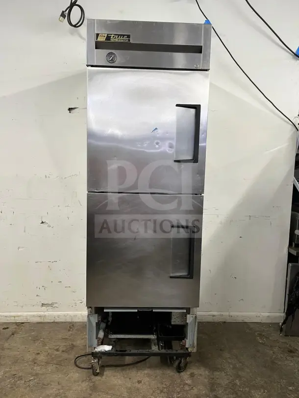 TRUE T-23-2 27" reach-in refrigerator with two left hinge solid doors, stainless steel, used condition, 115V.