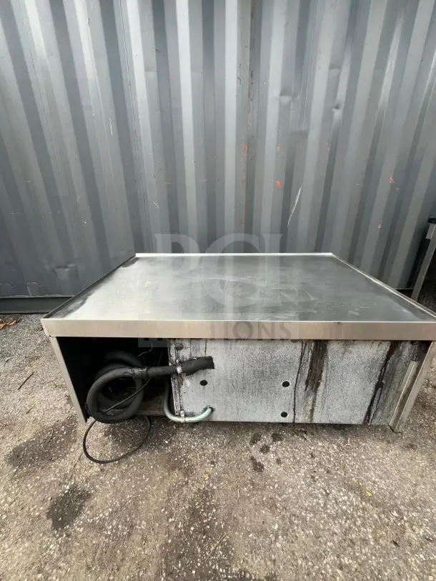 Randell 20048SC 2 Drawer Refrigerated Chef Base, stainless steel, visible wear, self-contained unit, external cables.