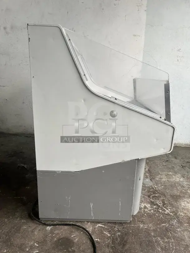Grab & Go open top display cooler in steel and white. Tested and working. Features a sturdy metal frame and clear top.